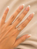 Anillo triple zirconia