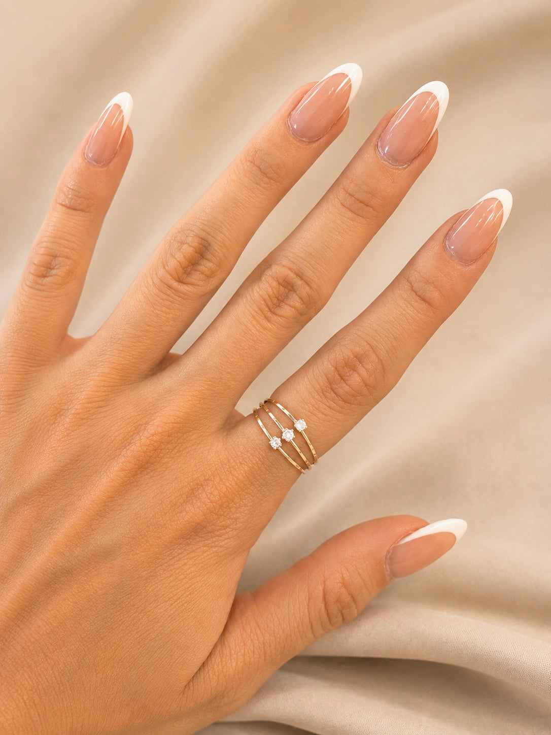 Anillo triple zirconia