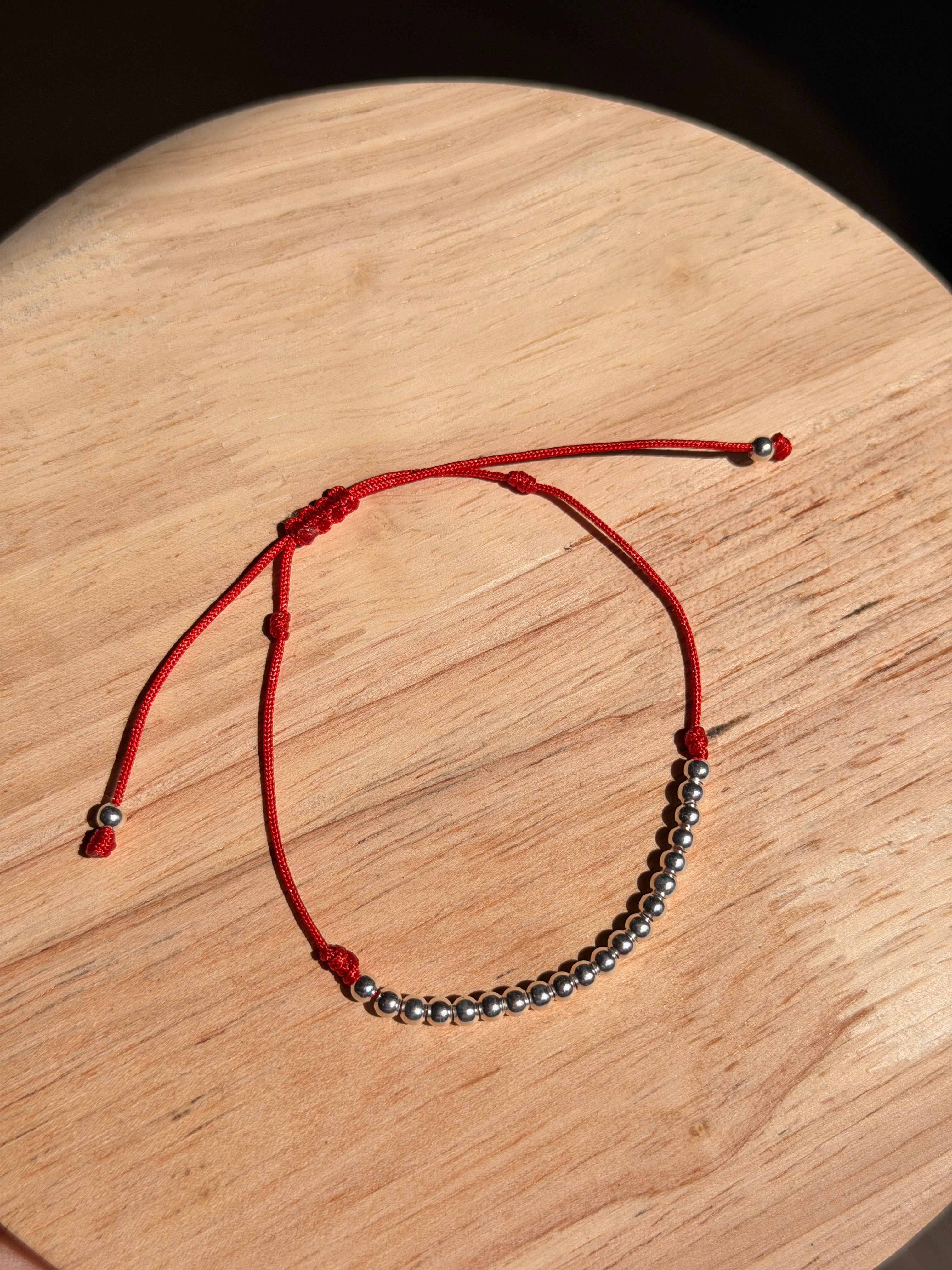 Pulsera bolitas